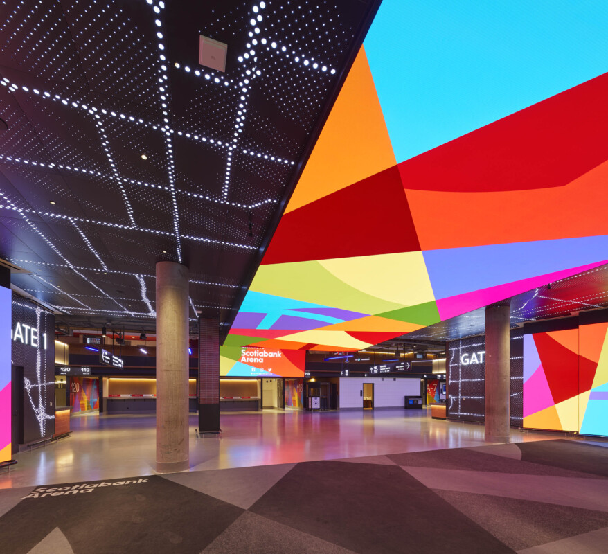 Scotiabank Arena Union Station entrance with Agilis backlit perforated ceiling and LED displays.