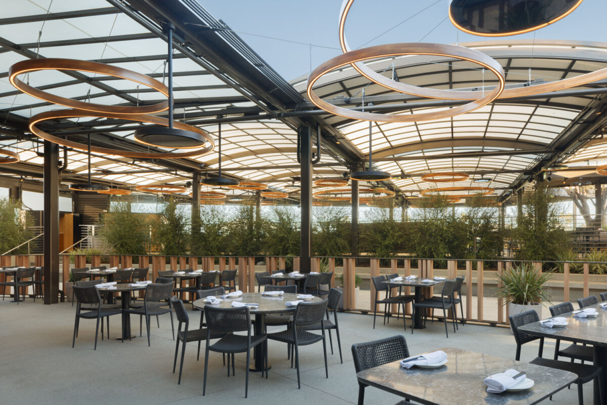 View of the exterior patio dining area of Din Tai Fung in Santa Monica, California. Showcasing Maxxit's exterior custom railing feature.